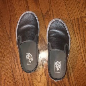 Woman’s silver vans